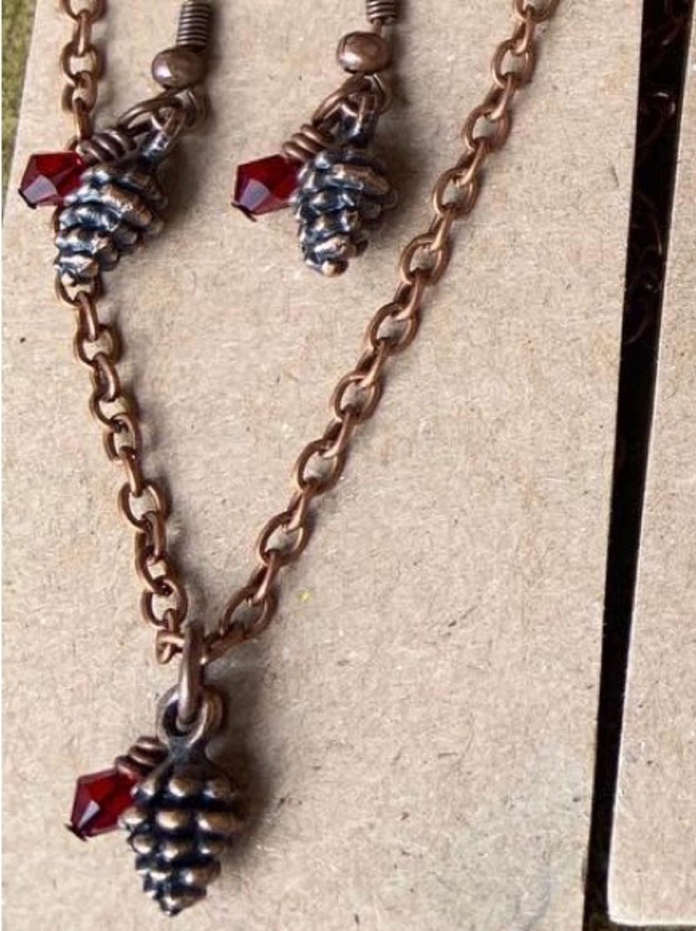 Copper-Tone Pinecone Earrings with Red Crystal Accent